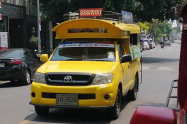 <a href="https://commons.wikimedia.org/wiki/File:Songthaew_in_Chiang_Mai_(3).jpg">Patiparn.Nice2002bkk</a>, <a href="https://creativecommons.org/licenses/by-sa/4.0">CC BY-SA 4.0</a>, via Wikimedia Commons Chiang Mai Songthaews 10