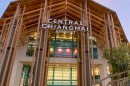 Exterior view of Central Chiangmai Airport with modern architecture and wooden accents.